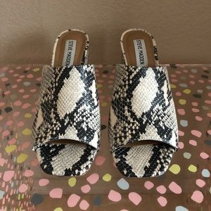 Steve Madden snake print mules.